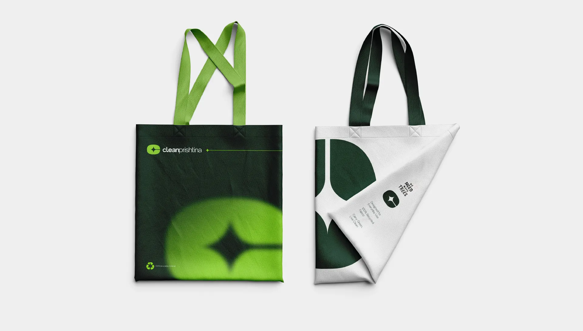 Clean Prishtina tote bags in dark green and white, printed on recycled fabric