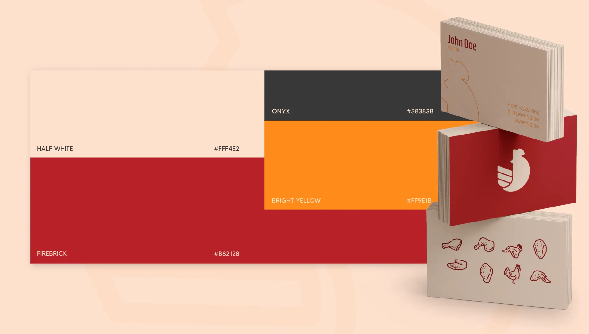 The Wings colour palette, half white, firebrick, onyx and bright yellow, beside printed business cards